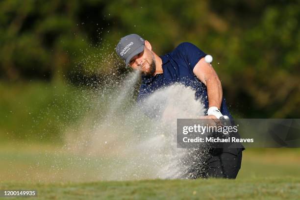 Pitcher Bud Norris plays a shot from the fourth bunker during the second round of the Diamond Resorts Tournament of Champions at Tranquilo Golf...