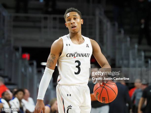 Mika Adams-Woods of the Cincinnati Bearcats in action in the game against the Tulsa Golden Hurricane in action in the game against the Tulsa Golden...