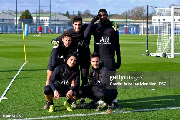 Marco Verratti, Pablo Sarabia, Julian Draxler, Loic Mbe Soh and Sergio Rico pose after a Paris Saint-Germain training session at Ooredoo Center on...