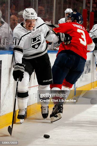 Austin Wagner of the Los Angeles Kings tangles with Keith Yandle of the Florida Panthers at the BB&T Center on January 16, 2020 in Sunrise, Florida.