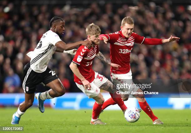 Josh Onomah of Fulham chases Hayden Coulson of Middlesbrough during the Sky Bet Championship match between Fulham and Middlesbrough at Craven Cottage...