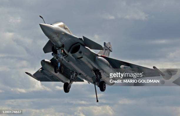 French Rafale fighter jet approach to the French aircraft carrier, Charles de Gaulle, off the eastern coast of Cyprus in the Mediterranean Sea on...