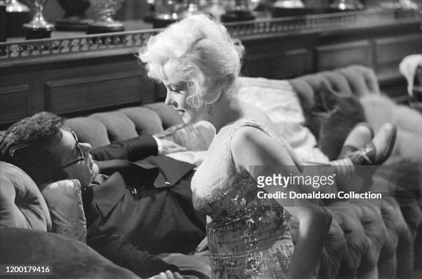 Actress Marilyn Monroe and Tony Curtis during a scene from the movie "Some Like it Hot" in Los Angeles, California.