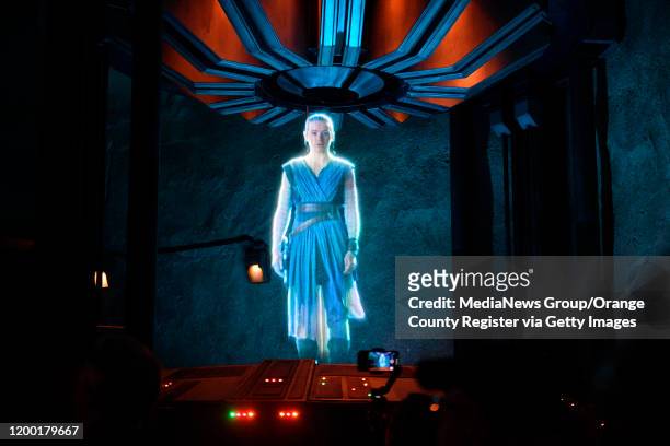 Hologram of Rey greet resistance fighters during Rise of the Resistance at Star Wars: Galaxy"u2019s Edge inside Disneyland in Anaheim, CA, on...