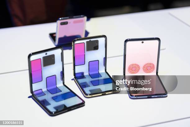 Samsung Electronics Co. Galaxy Z Flip smartphones are displayed during the Samsung Unpacked product launch event in San Francisco, California, U.S....