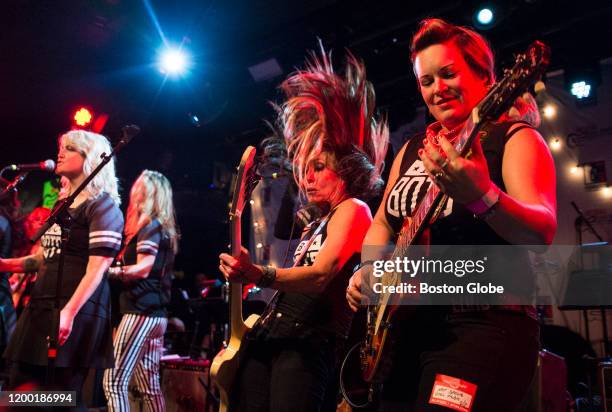 Gail Greenwood head bangs next to Amy Griffin during A Band of Their Owns' set at the Hot Stove and Cool Music show at the Paradise Rock Club in...