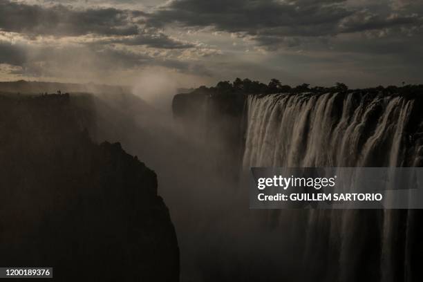 General view of Victoria Falls in Livingstone on January 23, 2020. The Victoria Falls, a UNESCO world heritage site measuring 108 meters high and...