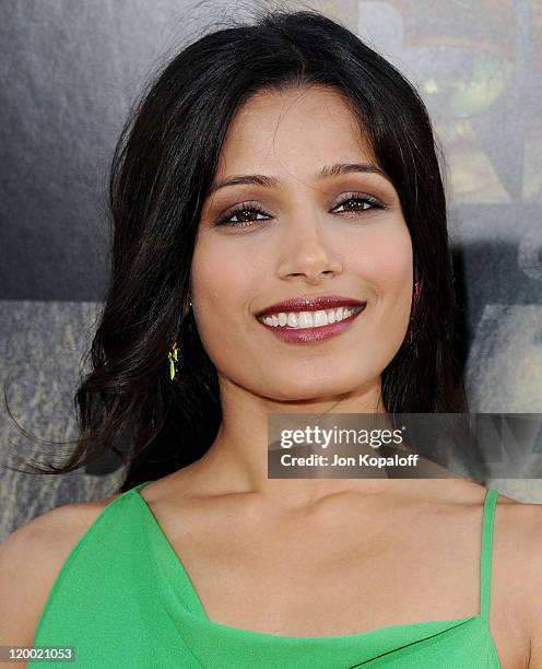 Actress Freida Pinto arrives at the Los Angeles Premiere "Rise Of The Planet Of The Apes" at Grauman's Chinese Theatre on July 28, 2011 in Hollywood,...