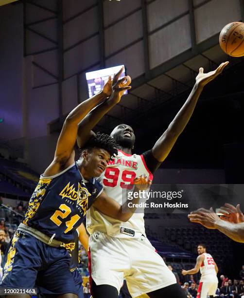 Alize Johnson of the Fort Wayne Mad Ants battles Tacko Fall of the Maine Red Claws on February 11, 2020 at Memorial Coliseum in Fort Wayne, Indiana....