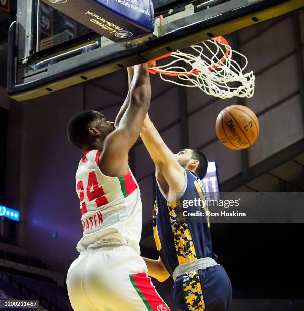 Goga Bitadze of the Fort Wayne Mad Ants get jammed on by Yante Maten of the Maine Red Claws on February 11, 2020 at Memorial Coliseum in Fort Wayne,...