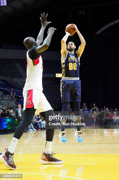 Goga Bitadze of the Fort Wayne Mad Ants shoots over Tacko Fall of the Maine Red Claws on February 11, 2020 at Memorial Coliseum in Fort Wayne,...