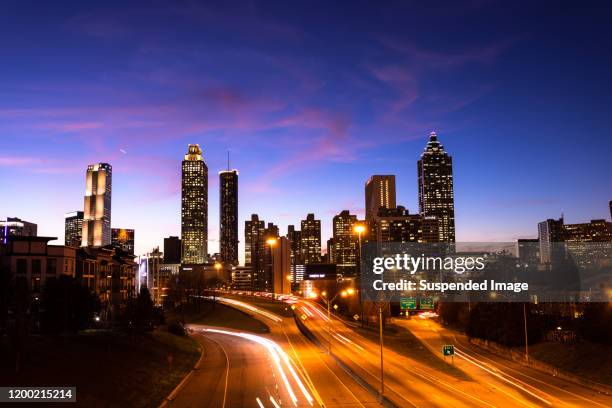 iconic view of atlanta at twilight - atlanta night life stock pictures, royalty-free photos & images