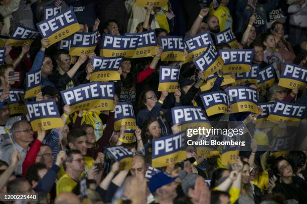 Attendees cheer during a primary night rally with Pete Buttigieg, former mayor of South Bend and 2020 presidential candidate, in Nashua, New...