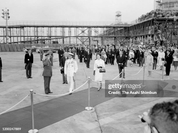 King Bhumibol and Queen Sirikit of Thailand are seen on departure at Haneda Airport on June 5, 1963 in Tokyo, Japan.