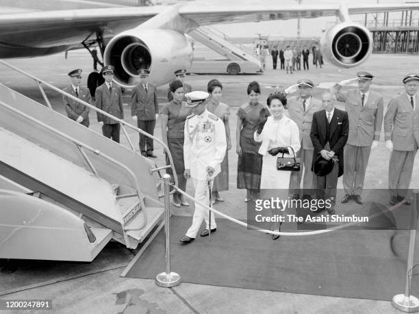 King Bhumibol and Queen Sirikit of Thailand are seen on departure at Haneda Airport on June 5, 1963 in Tokyo, Japan.