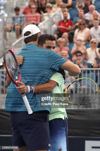 Fabrice Martin of France and Maximo Gonzalez of Argentina celebrate winning the men's doubles grand final against Ivan Dodig of Croatia and Filip...