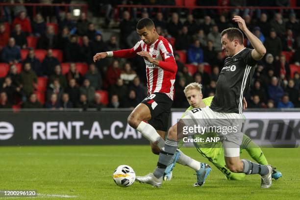 , Cody Gakpo of PSV, Arild Ostbo of Rosenborg BK, Even Hovland of Rosenborg BK during the UEFA Europa League group D match between PSV Eindhoven and...