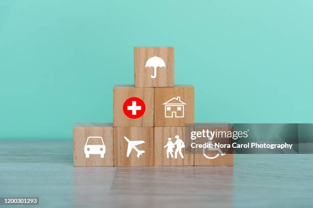 insurance concept - wooden shield stock pictures, royalty-free photos & images