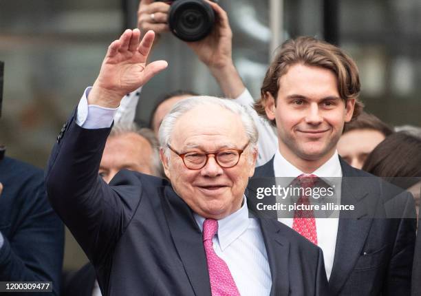 February 2020, Baden-Wuerttemberg, Offenburg: Publisher Hubert Burda raises his hand at the media group's staff party. On the right is Jacob Burda....