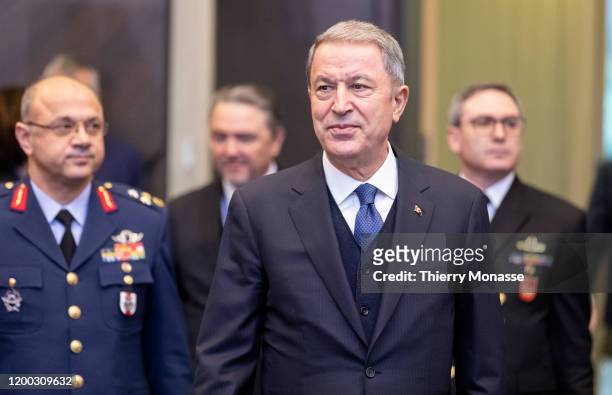 Turkish Defense Minister Hulusi Akar arrives for the first meeting of NATO ministers in the North Atlantic Treaty Organization headquarter on...