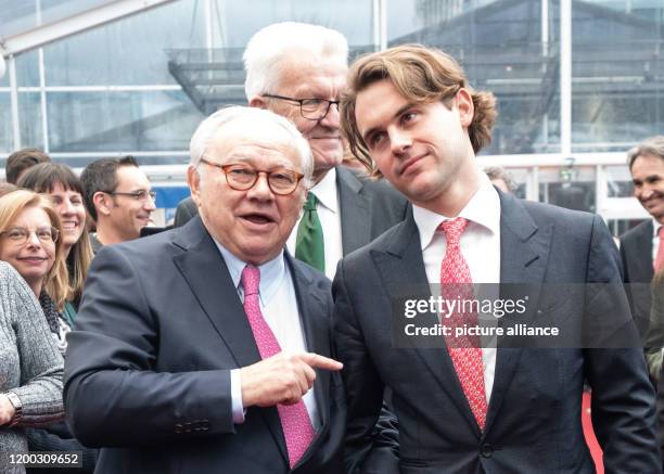 February 2020, Baden-Wuerttemberg, Offenburg: Publisher Hubert Burda , his son Jacob Burda and Winfried Kretschmann, Minister President of...