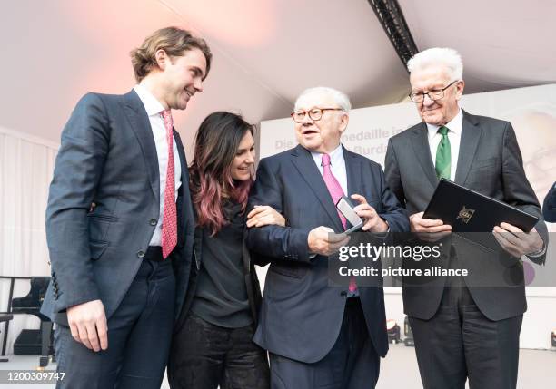 February 2020, Baden-Wuerttemberg, Offenburg: Jacob Burda, Elisabeth Burda, publisher Hubert Burda and Winfried Kretschmann, Prime Minister of...