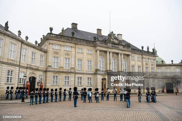 Royal Guard, Den Kongelige Livgarde, during Honor Guard Change Ceremony at Royal Amalienborg Palace in Copenhagen, Denmark. February 2020