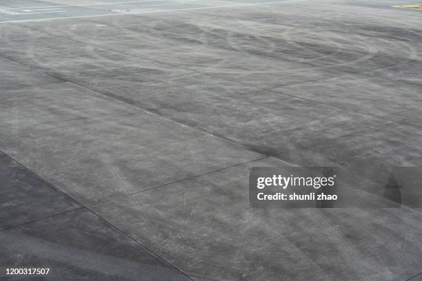 close up of airport runway - airport runway from above stock pictures, royalty-free photos & images