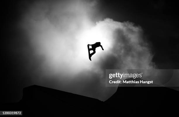 This images was converted into black and white from a color original). Stine Espeli Olsen of Norway competes in Women's Snowboard Slopestyle during...