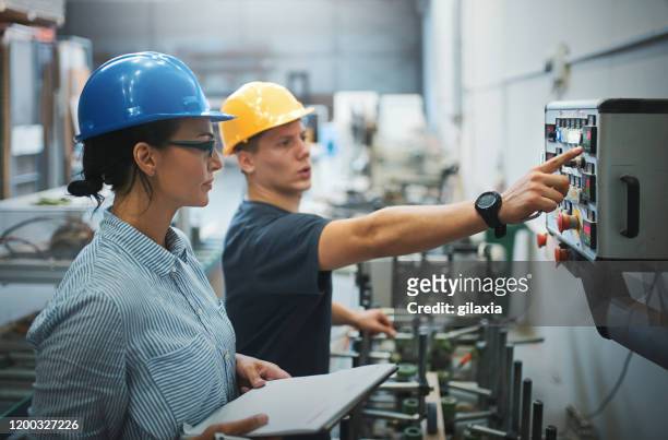 production facility supervision. - panal stock pictures, royalty-free photos & images