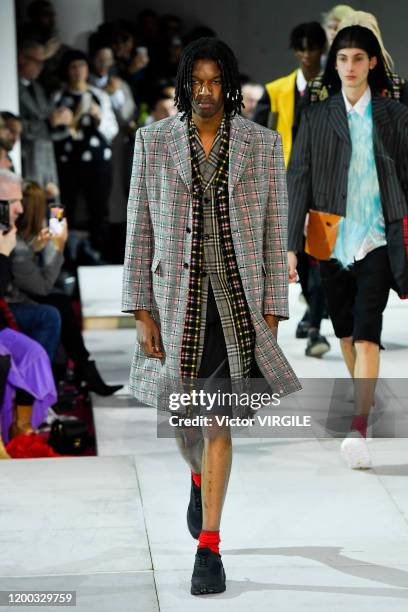 U2013 JANUARY 17: A model walks the runway during the Comme Des Garcons Homme Plus Menswear Fall/Winter 2020-2021 fashion show as part of Paris...