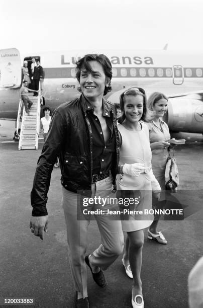 French actor Alain Delon welcomes Austrian born actress Romy Schneider at Nice airport before travelling to the set of the the movie 'The Swimming...