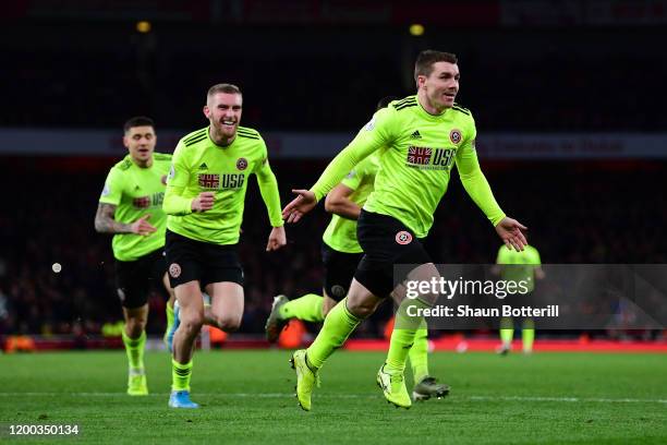 John Fleck of Sheffield United celebrates scoring his sides first goal during the Premier League match between Arsenal FC and Sheffield United at...