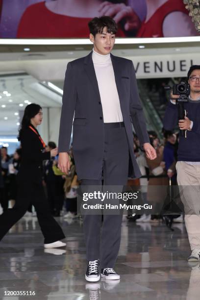 South Korean actor Kim Young-Kwang attends the photocall for 'Lancome' advanced genifique red edition launch event at Lotte World Mall on January 18,...