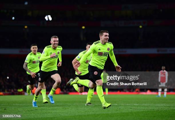John Fleck of Sheffield United celebrates after scoring his sides first goal during the Premier League match between Arsenal FC and Sheffield United...
