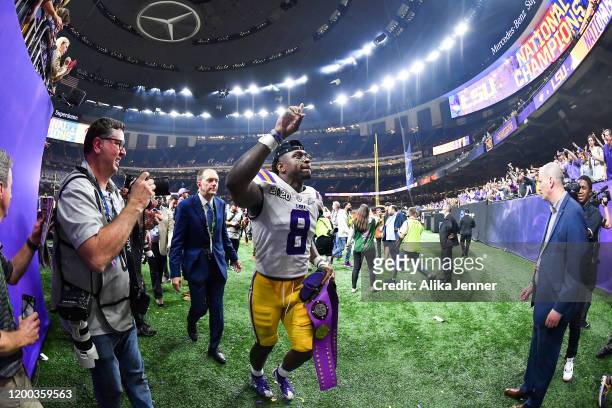 Patrick Queen of the LSU Tigers waves to fans after the College Football Playoff National Championship game against the Clemson Tigers at the...