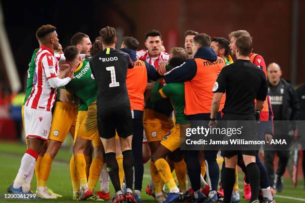 Stoke City and Preston North End players clash during the Sky Bet Championship match between Stoke City and Preston North End at Bet365 Stadium on...