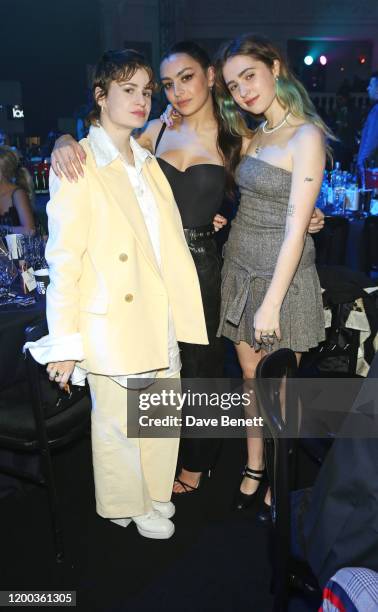 Christine and the Queens aka Heloise Letissier, Charli XCX and Clairo attend The NME Awards 2020 at the O2 Academy Brixton on February 12, 2020 in...