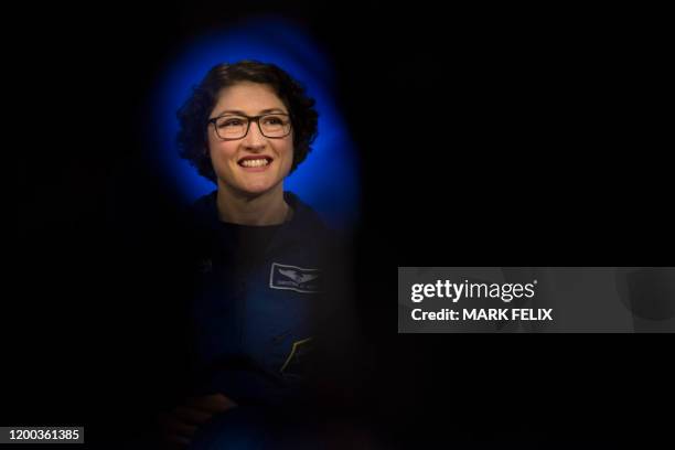 Astronaut Christina Koch answers questions during a postflight news conference at the Johnson Space Center in Houston, Texas on February 12, 2020....