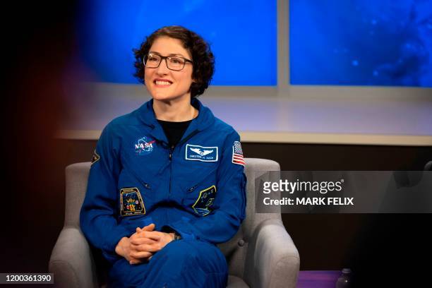 Astronaut Christina Koch answers questions during a postflight news conference at the Johnson Space Center in Houston, Texas on February 12, 2020. -...