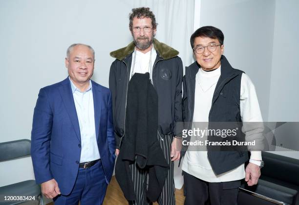 Li Ning, Stefano Pilati and Jackie Chan attend the Li-Ning Menswear Fall/Winter 2020-2021 show as part of Paris Fashion Week on January 18, 2020 in...