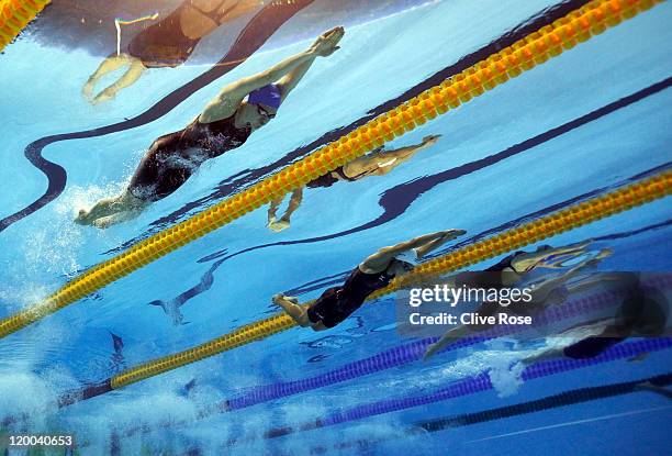 Jemma Lowe of Great Britain, Natsumi Hoshi of Japan and Ellen Gandy of Great Britain compete in the Women's 200m Butterfly Final during Day Thirteen...