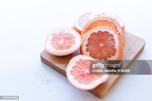 pink grapefruit - pink grapefruit stock pictures, royalty-free photos & images