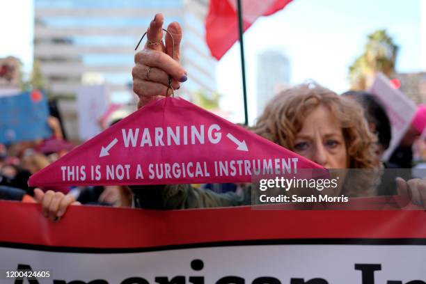 Activists participate in the 4th Annual Women's March LA: Women Rising at Pershing Square on January 18, 2020 in Los Angeles, California.