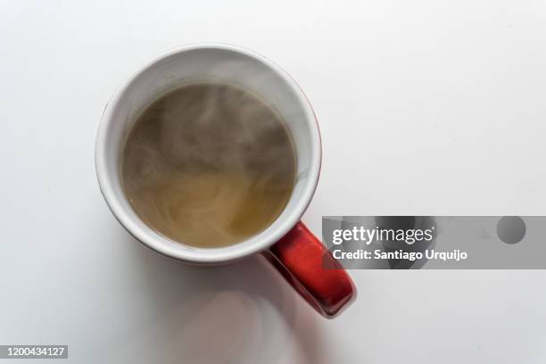 steam coming out of a coffee mug - coffee cups top view stock pictures, royalty-free photos & images