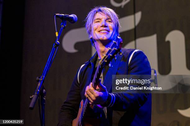 Musician Johnny Rzeznik of Goo Goo Dolls performs at the Taylor booth at The NAMM Show - Day 3 at Anaheim Convention Center on January 18, 2020 in...