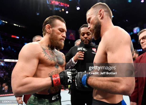 Conor McGregor of Ireland and Donald Cerrone face off prior to their welterweight fight during the UFC 246 event at T-Mobile Arena on January 18,...