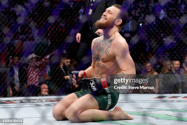 Conor McGregor celebrates his first round TKO victory against Donald Cerrone in a welterweight bout during UFC246 at T-Mobile Arena on January 18,...