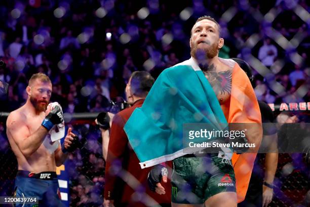 Conor McGregor celebrates his first round TKO victory against Donald Cerrone in a welterweight bout during UFC246 at T-Mobile Arena on January 18,...