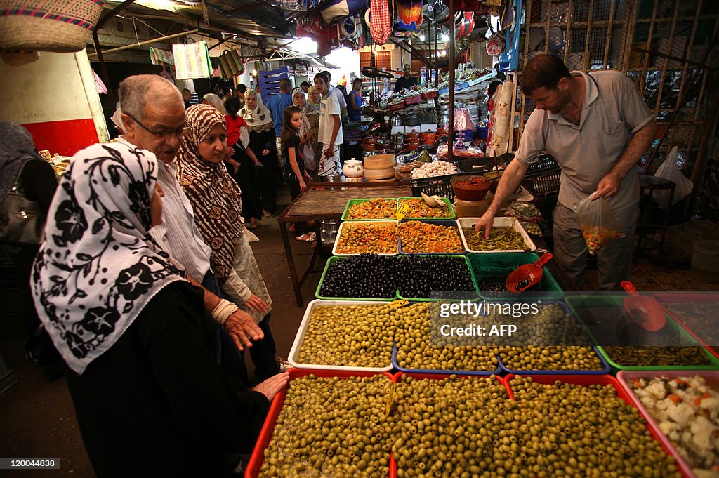 People shop at Ali Mellah market in Algi